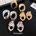 Sculptural Open Oval Earrings in Gold and Silver Tones view 3