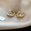 Interlocking Double Hoop Clip On Earrings in Gold and Silver view 7
