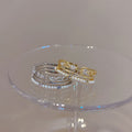 Four Row Open Ring In Silver Tone Or Gold Tone With Clear Stones view 1