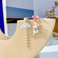 Two Rabbit Cloud Bow and Pom Pom Asymmetrical Earrings view 3