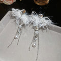 Silver Crystal Pearl Bow Necklace White Feather Tassel Earrings view 6