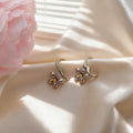 Silver Daisy Flower Huggie Hoop Earrings Gold Center view 2