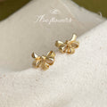 Gold Textured Ribbon Bow Earrings Stud and Clip Styles view 6