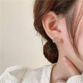 Crystal Fan Stud Earrings in Gold and Silver Tones view 2