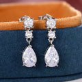 Three-Stone Pear-Shaped Long Drop Earrings In Polished Silver Tone view 2
