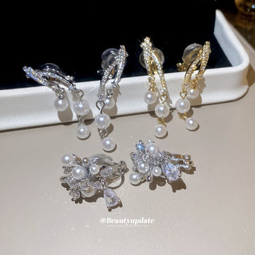 Pearl Cluster Floral Dangle Clip On Earrings With Polished Metal Details