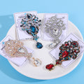 Ornate Crystal Dangle Brooch An Ornate Scrollwork Brooch view 3