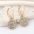 Gold Tone Crystal Smile and Frown Medallion Huggie Earrings view 3