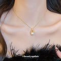 Gold Tone Crystal and Faux Pearl Drop Pendant Necklace view 1