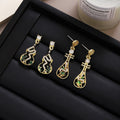Gold Tone Pipa Leaf Openwork Long Dangle Stud Earrings view 1