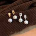 Gold Tone Molten Texture Stud Earrings With Pearl Drop view 3