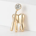 Dentist Tooth and Mirror Brooch in Two Metal Tones view 2
