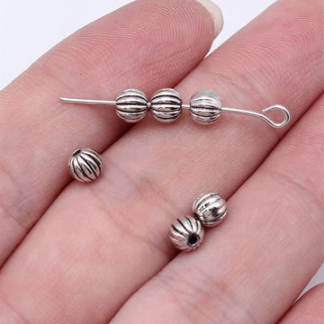 Grooved Pumpkin Round Beads in Silver and Gold Tones