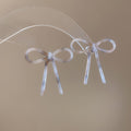 Slim Bow Stud Earrings In Brown Blue And White Patterns view 6