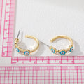Gold Tone Crystal Enamel Round Evil Eye Hoop Earrings in Five Colors view 5