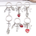 Six Silver Tone Medical Tool and Heart Keychains with Metal Hardware view 2