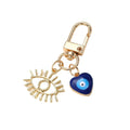 Gold Tone Open Lash Eye and Blue Evil Eye Clip Keychains view 5