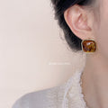Gold Tone Square Amber Resin Stud Earrings with Soft Corners view 2