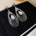 Layered Teardrop Wire Earrings with White Pearl Look Drops view 7