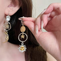 Gold and Silver Celestial Floral Asymmetric Stud Earrings view 3