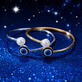 Gold and Silver Tone Blue Evil Eye Faux Pearl Open Cuff Bracelets view 1