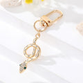 Gold Tone Sculpted Snake and Cobra Shape Clip Keychains view 9