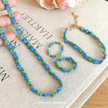Blue Green Seed Bead Flower Necklace Bracelet Rings Four view 1