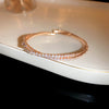 Gold Crossing Bangle