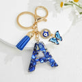 Blue Resin Alphabet Letter Keychain With Butterfly Evil Eye Charm Tassel view 2