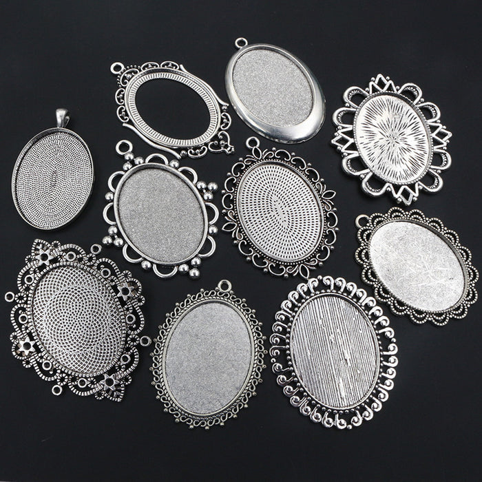 Assorted Ornate Oval Cabochon Pendant Trays in Silver Tone Metal