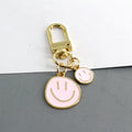 Gold Tone Double Smiley Face Charm Clip Keychains in Six Colors view 2