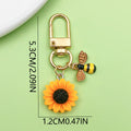 Bee and Honeycomb Charm Keychains Featuring Yellow Sunflower Across 25 Pictured Variations view 2