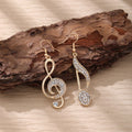Mismatched Treble Clef and Music Note Hook Earrings view 2