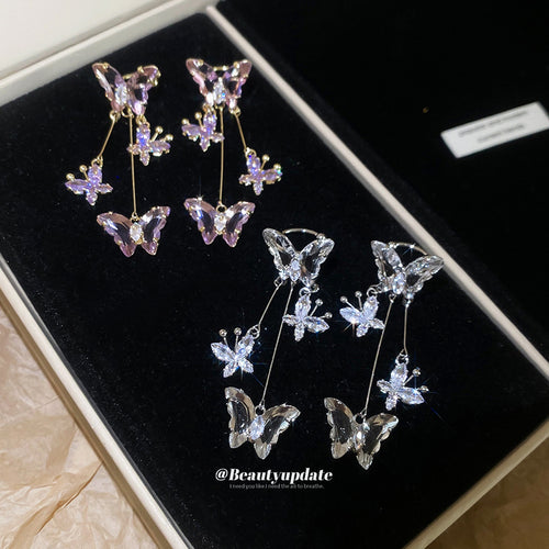 Close display of the crystal butterfly vine ear cuff earrings fashion jewelry accessory