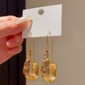 Long Faceted Resin Teardrop Earrings in Gold and Silver Tones view 7