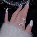 Silver Tone Crescent Moon Ring With Pearl Like Drops And Stars view 1