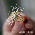 Gold Tone Open Star Burst Clear Center Stone Finger Ring view 4