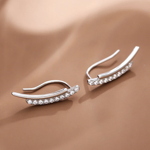 Silver Tone double curve ear climbers shown in alternate close-up view