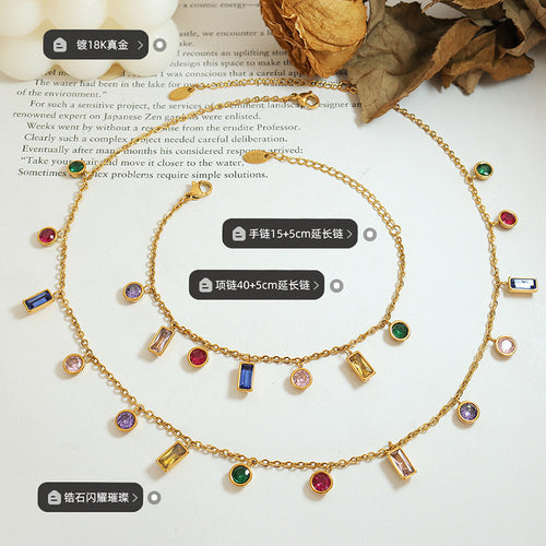 Gold multicolor zircon charm necklace and bracelet flat lay with plating and length labels