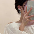 White Bow Pearl Chain Drop Earrings with Polished Metal Accents view 3
