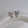 Silver Tone Bow And Star Drop Stud Earrings In Pink And Clear Stone view 6