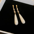 Gold Tone Long Chain White Teardrop Pearl Drop Earrings view 6
