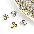 Black Outline Four Leaf Clover Charms in Gold and Silver Tones view 1