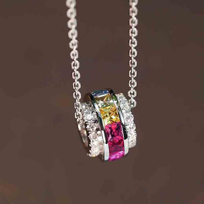 Additional product view showing silver-tone multicolor baguette channel wheel pendant necklace