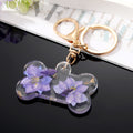 Transparent Resin Pressed Flower Dog Bone Clip Keychains in Three Colors view 7