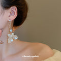 White Flower And Crystal Curved Long Dangle Earrings view 3