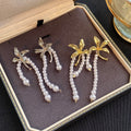 Gold and Silver Flower Pearl Look Long Loop Earrings view 2