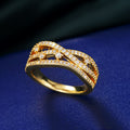 Gold Tone Interwoven Openwork Ring With Clear Stones view 1
