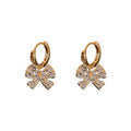 Gold Crystal Bow Huggie Hoop Earrings Polished Metal Jewelry view 5