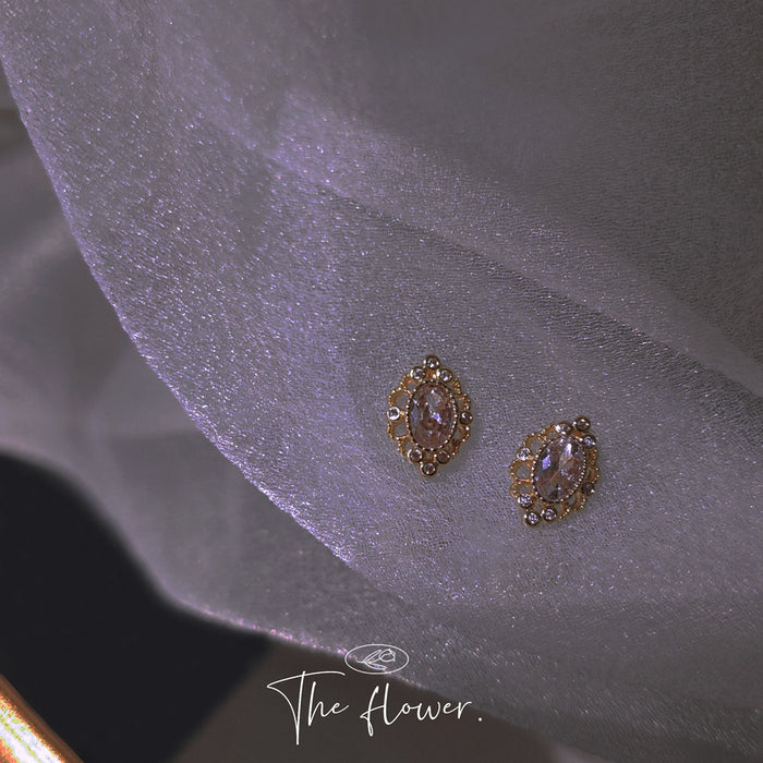 Gold Tone Smoky Oval Stone Ornate Floral Halo Stud Earrings